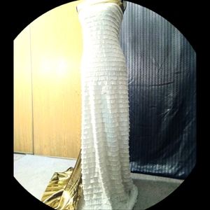 A gold prom dress or a wedding party dress in a small size.